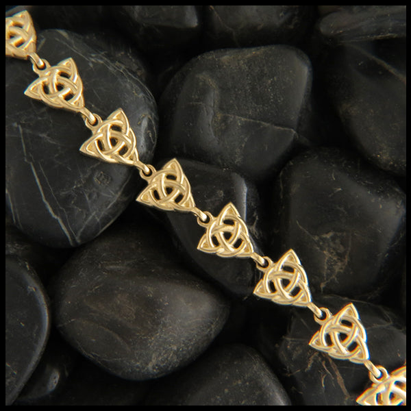 open trinity knot celtic bracelet in Yellow Gold