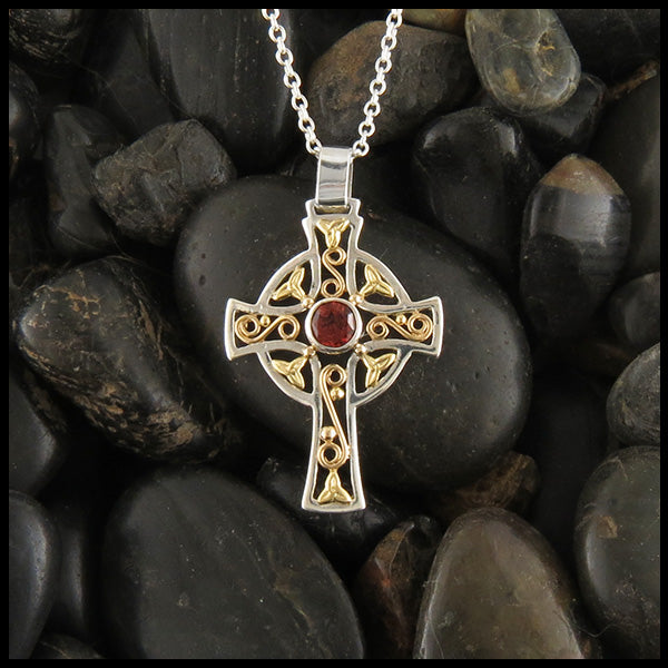 Custom silver and gold cross with garnet