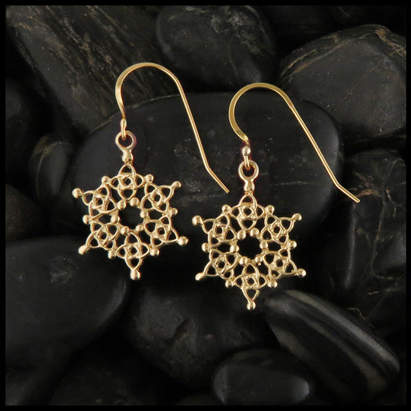 Celtic knot snowflake earrings in gold