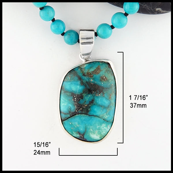 15/16 inch by 1 7/16 inch Beaded Turquoise pendant and necklace