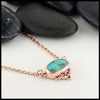 Profile view black opal choker necklace in rose gold