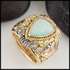 Ethiopian Opal Ring in yellow, rose, and white gold
