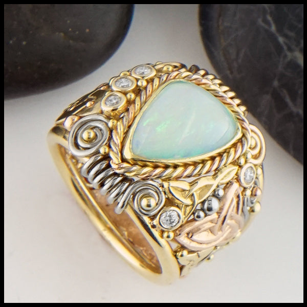 Ethiopian Opal Ring in yellow, rose, and white gold