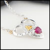 Profile view Trinity Knot and Heart Shaped Ruby Necklace