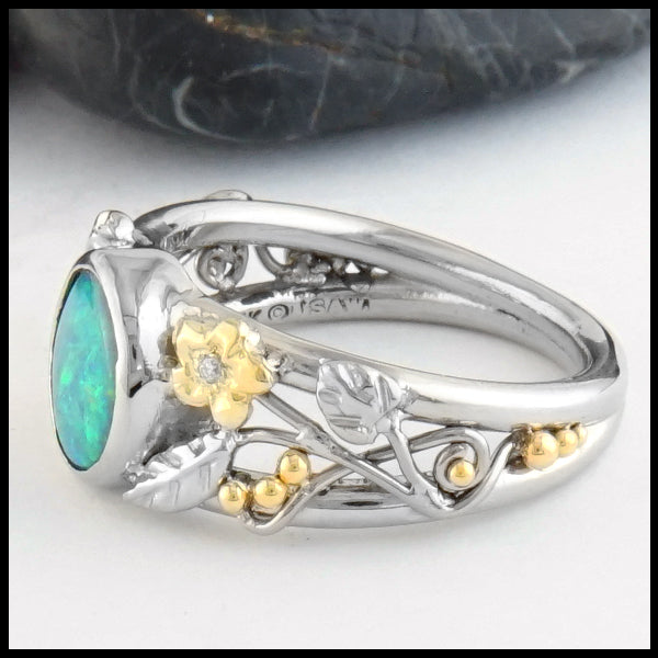 Profile view of Floral Black Opal Gold Ring