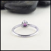 back view of trillion purple sapphire ring in white gold