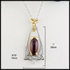 1 by 9/16 inch Oval Garnet and Trinity Knot Gold Pendant