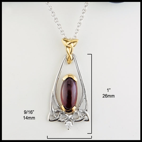 1 by 9/16 inch Oval Garnet and Trinity Knot Gold Pendant