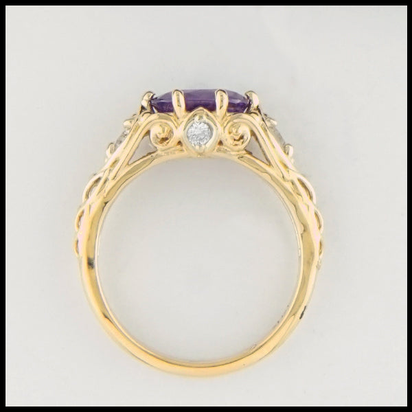 Profile view of Purple Sapphire and diamond gold ring