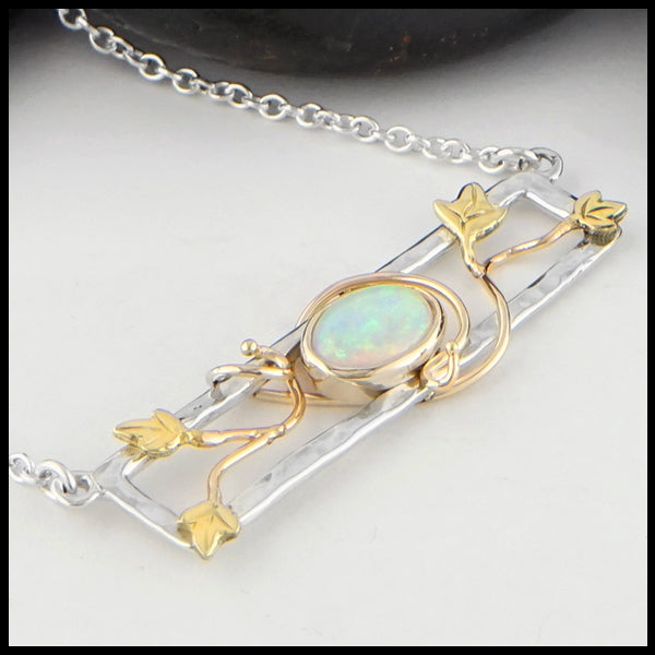 Profile view of Opal and Gold Ivy Bar Necklace