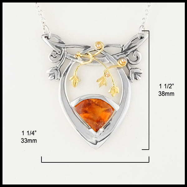Citrine and Ive Pendant measures 1 1/2" by 1 1/4"