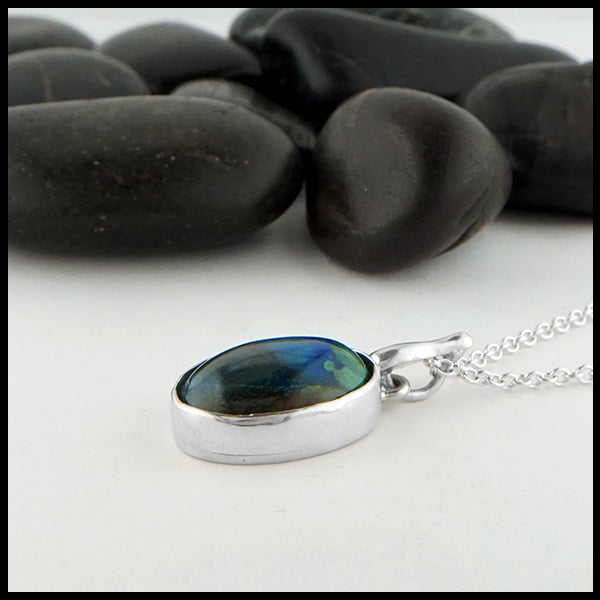 Profile view of azurite pendant