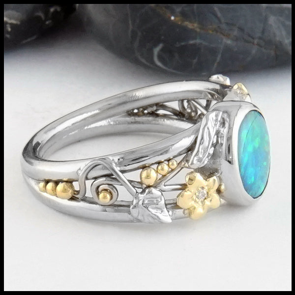 Profile view of Floral Black Opal Gold Ring