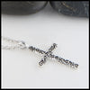 Profile view of Trinity Scroll Cross in Sterling Silver