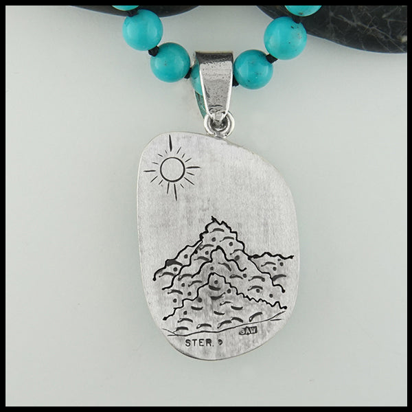 Rear view of pendant engraved design 