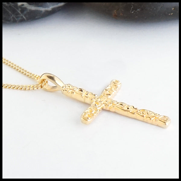 Profile view of Trinity Scroll Cross in 14K Gold