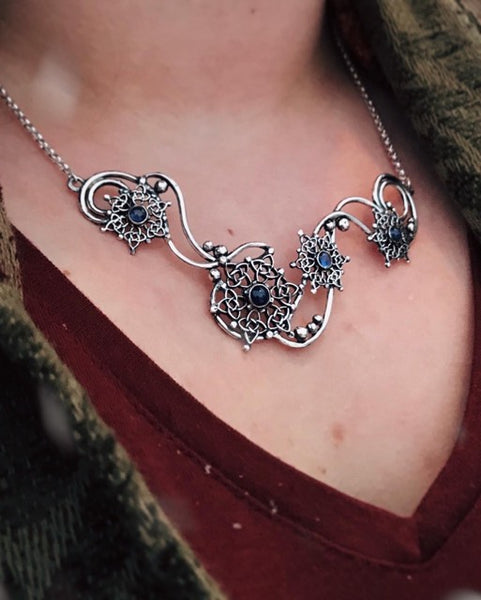 Custom Sapphire Snowflake necklace by Walker Metalsmiths