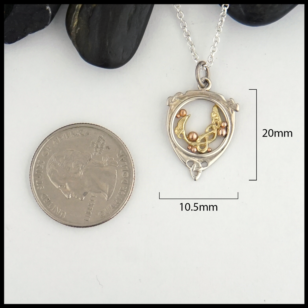 Celtic flourish pendant measures 20mm by 10.5mm