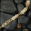 Gold Josephine's Knot link bracelet with Diamonds
