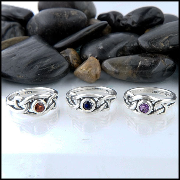 Celtic knot ring with gemstone in sterling silver