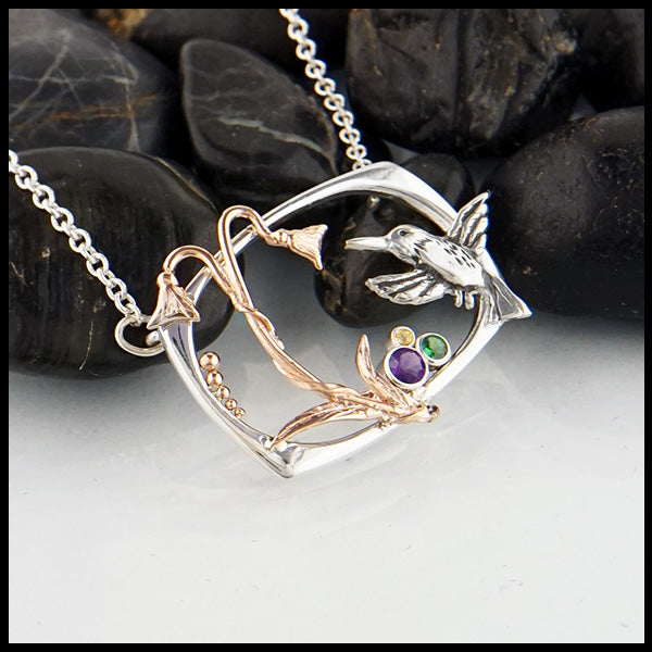 Hummingbird and flower pendant in sterling silver and 14K Rose gold with Amethyst, Tsavorite, and yellow sapphire