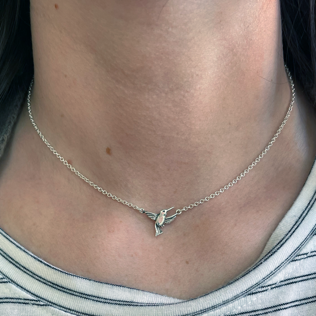 Hummingbird Necklace in sterling silver on neck